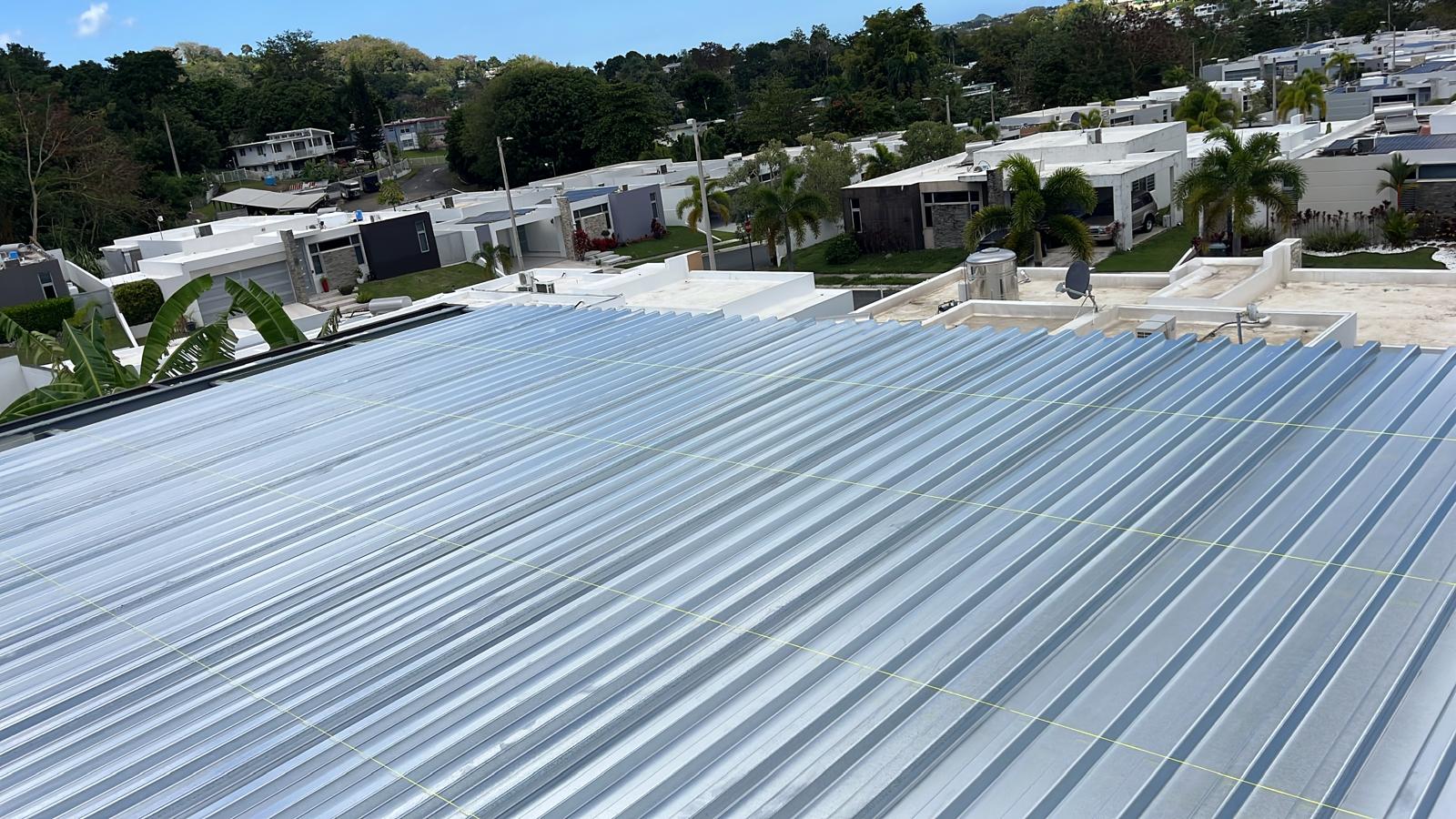 Metal roof panel installation